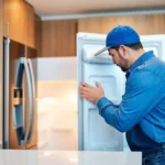 Skilled technician performing appliance repair Toronto in a modern kitchen setting with bright